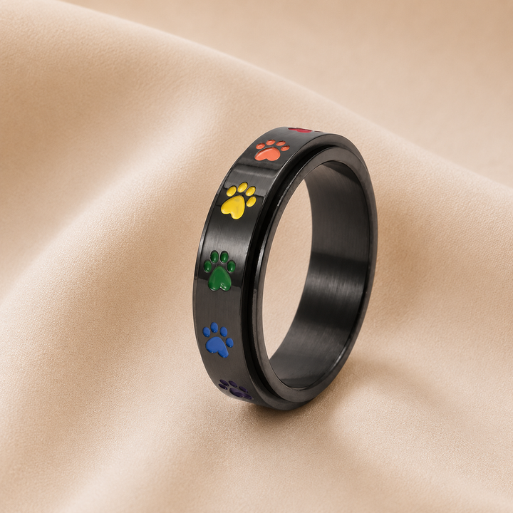 Rotating Stress Relief Ring – Stainless Steel with Rainbow Paw Prints