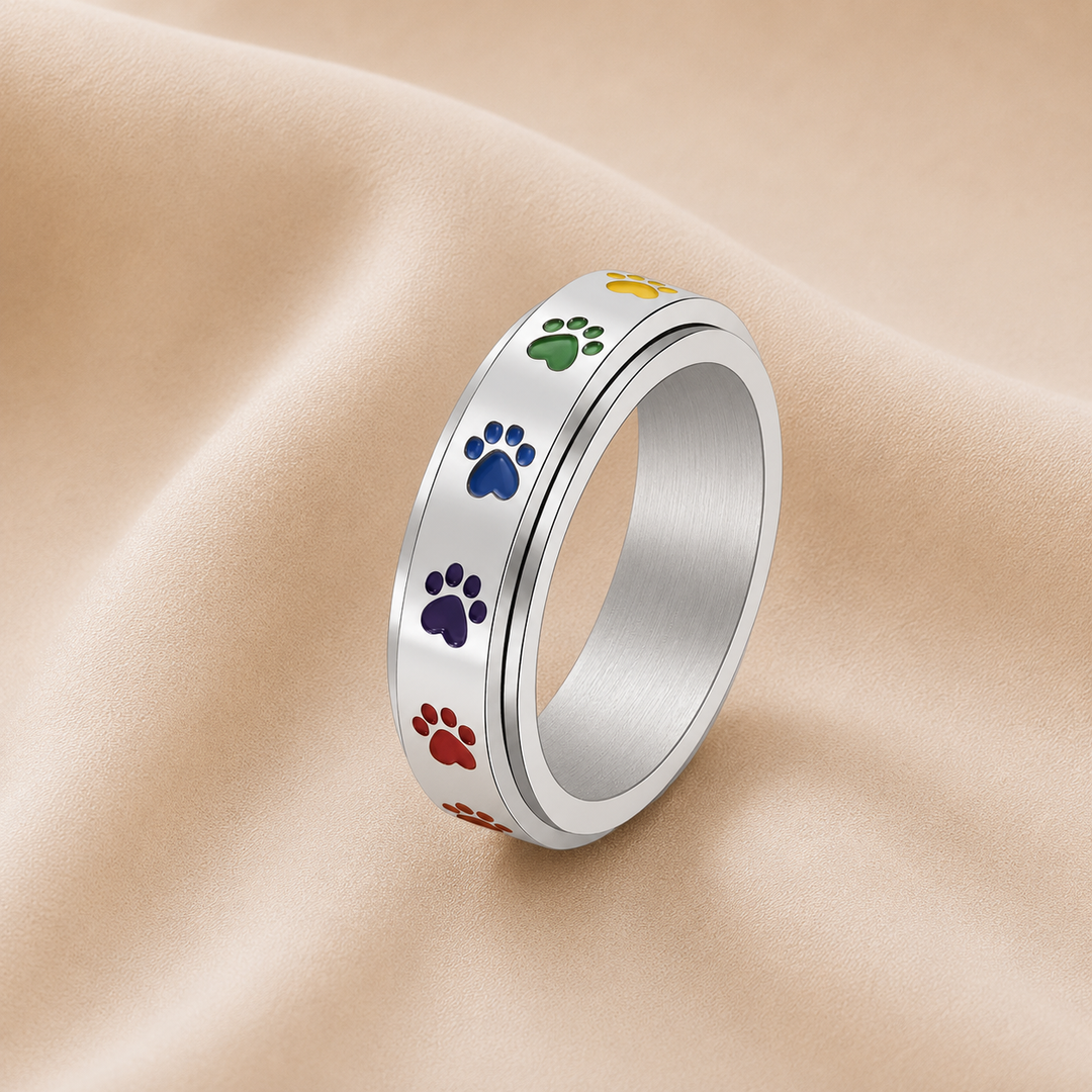 Rotating Stress Relief Ring – Stainless Steel with Rainbow Paw Prints