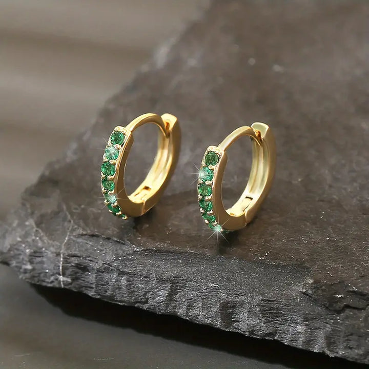Drop earrings in gold inspired by the coast