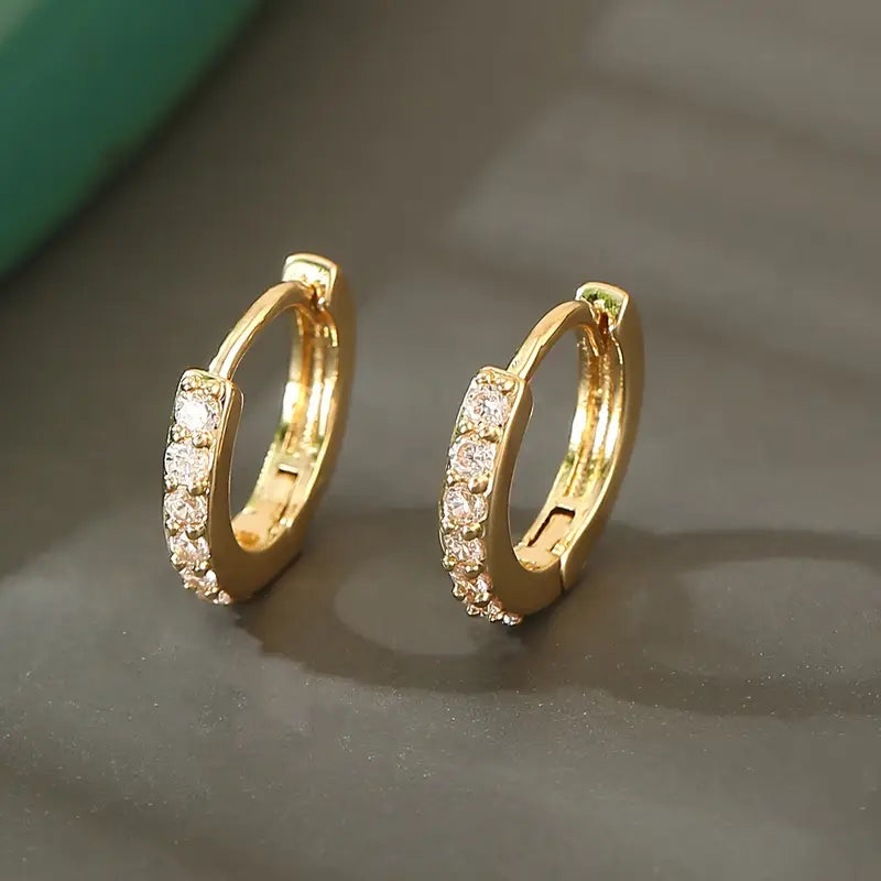 Drop earrings in gold inspired by the coast
